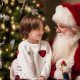 Young-Boy-in-Awe-Sits-on-Santas-Lap