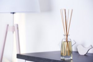 diffuser on a end table with lamp beside