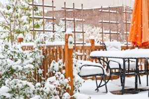 snow filled backyard in Kelowna home for sale 