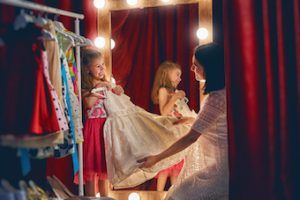 little girl dressing up as a princess