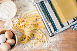 homemade pasta in pasta roller 