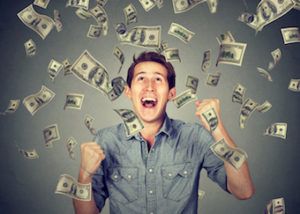 young man with money floating in air around 