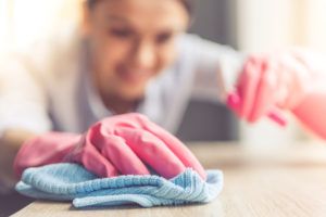 lady cleaning her Kelowna home