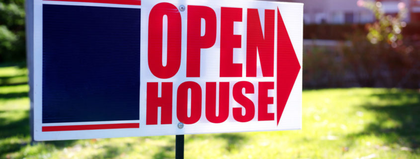 open house sign in front of Kelowna real estate