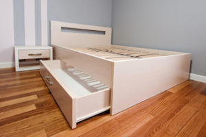 bed with drawers in small Glenmore condo