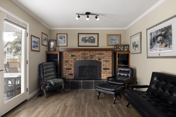 759 McClure Road - Lounge room with brick fireplace QVA