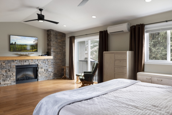 759 McClure Road - Master bedroom with stone fireplace QVA