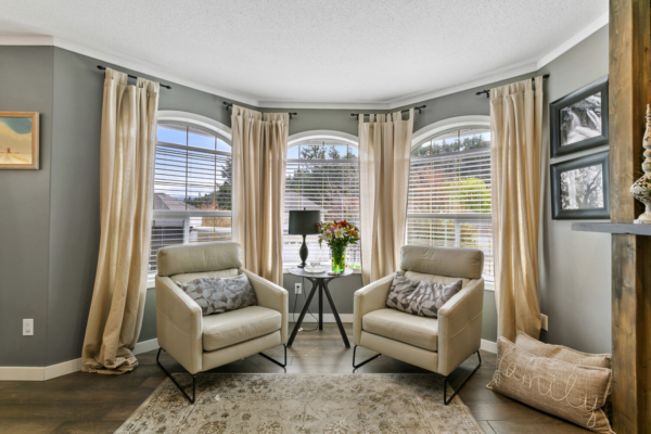336 Woodpark Crescent - living room with bay windows - Tracey Vrecko