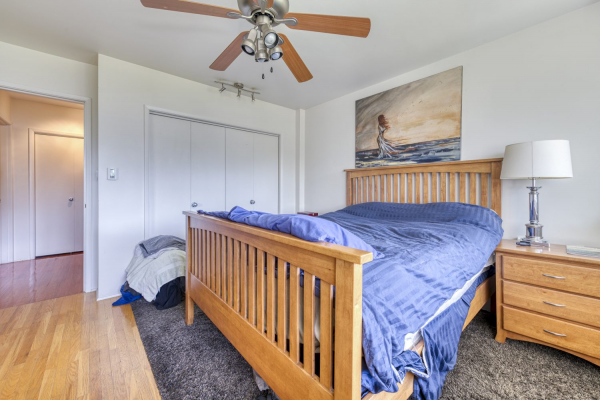205-4058 Lakeshore Road - simple bedroom - QVA