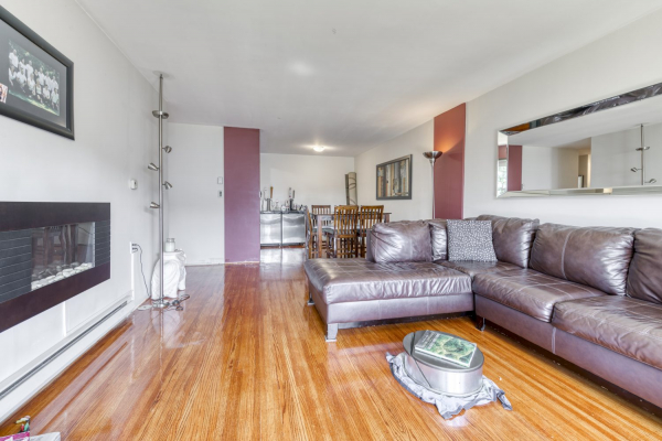 205-4058 Lakeshore Road - bright condo living room- QVA