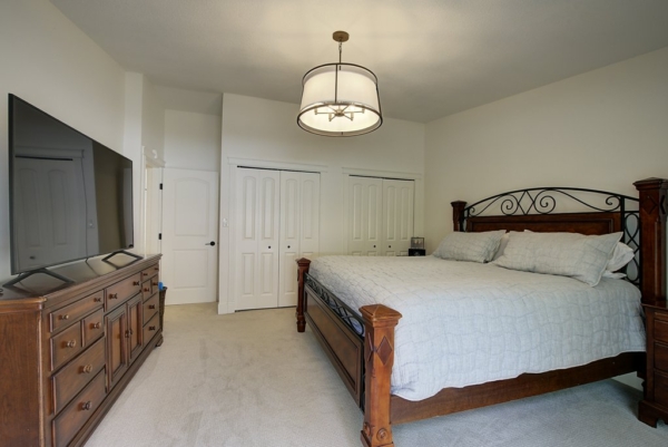 Primary bedroom with double closets, natural lighting in 2650 Lakeview