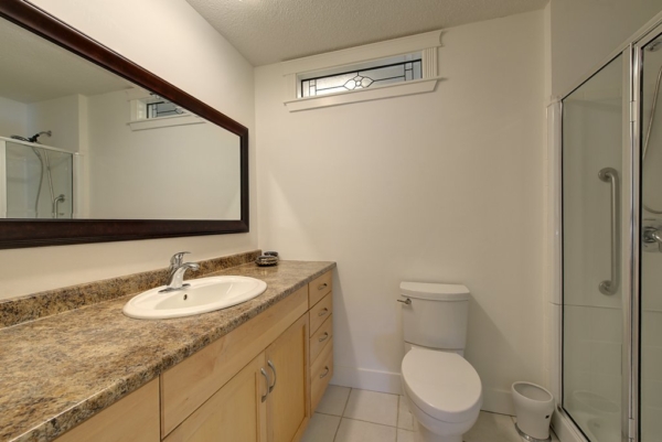 Four Piece bathroom with large countertops and walk-in shower in 2650 Lakeview